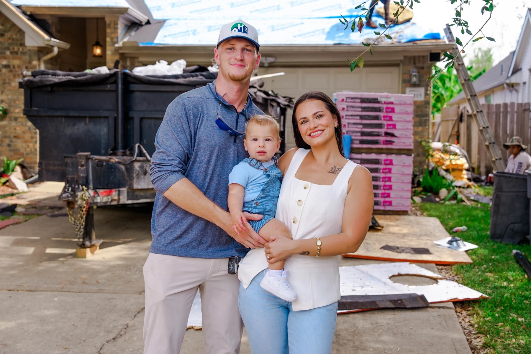 Chance Hill and his family together at a Hill Heights roofing project